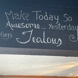 chalk writing on a wall