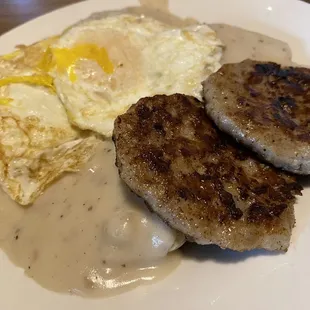 Biscuits and gravy, 2 eggs over easy and sausage patties