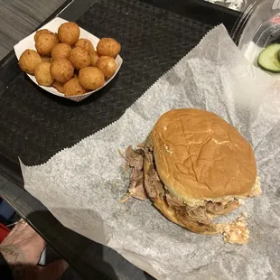 Coarse chopped BBQ sandwich and Hushpuppies. It is some amazing BBQ.