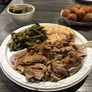 Coarse chopped pork with bbq slaw and green beans.