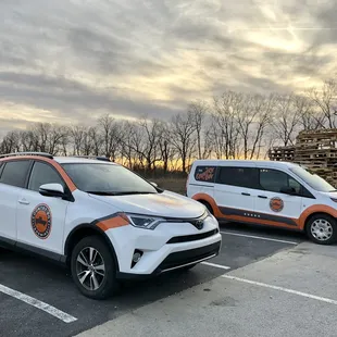 two vehicles parked in a parking lot