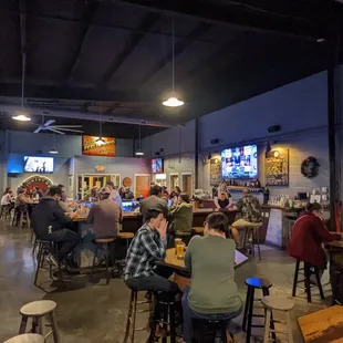 a large group of people sitting at tables