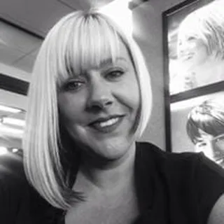 Melissa E.