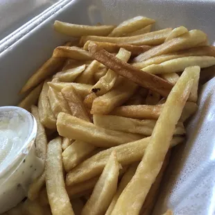 french fries in a styrofoam container