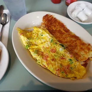 BYO omelette ft feta, tomatoes, broccoli, and perfectly fried hashbrowns