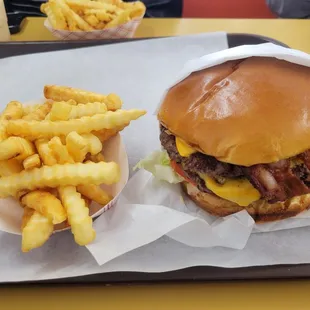 Double bacon cheeseburger with crinkle cut fries