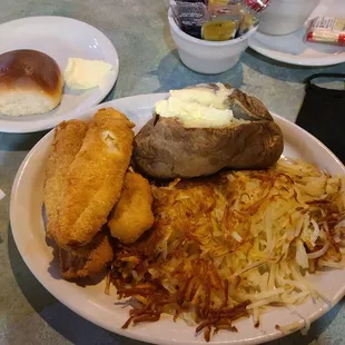 All you can eat fish, with hashbrowns and baked potatoe.