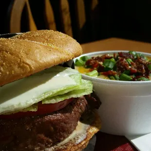 FALL INTO A BOWL OF LOADED POTATO SOUP PAIRED WITH A SIGNATURE STEAK SANDWICH