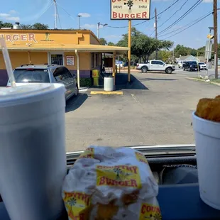 a cup of coffee and a donut