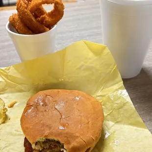 Bacon Cheeseburger with crispy onion rings and a sweet tea