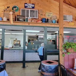 a woman standing in a restaurant