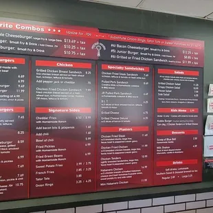 a menu on the wall of a restaurant