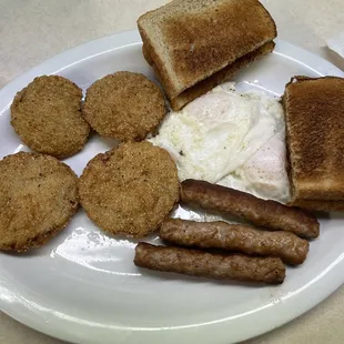 Eggs, fried green Tomatoes, sausage and toast