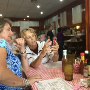 Here we t again . Food is good here . A lot of people come here