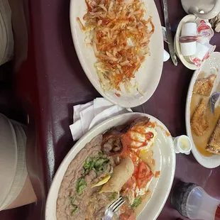 Huevos Rancheros plate w/ a side of hash browns!