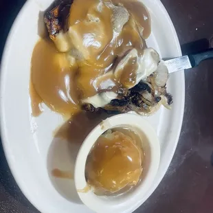 Country Grill chicken that was topped with grilled onions, mushroom Swiss cheese and brown gravy.