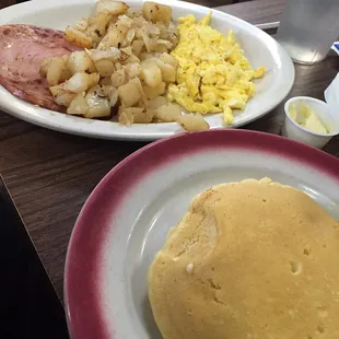 Pancakes, ham, eggs &amp; home fries.
