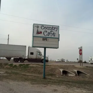 a sign for a country cafe