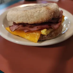 Ham breakfast sandwich on English muffin.