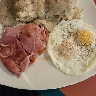 Lighter side breakfast option (no potatoes).  Biscuit and gravy, 2 eggs, and ham.
