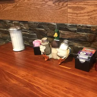 Cute salt and pepper holders. Each table has its own animal