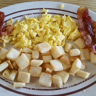 My scrambled eggs and bacon. Next time I&apos;ll get the regular hash browns.