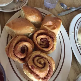 Dinner and cinnamon rolls with meal