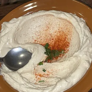 a close up of a bowl of dip