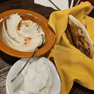 Baby hummus,  garlic, and bread basket