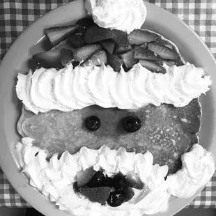 Ms Kristine made Gabe's day with his santa pancake! Love this establishment