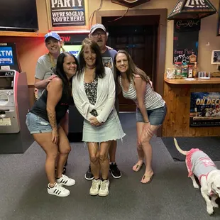 a group of friends posing for a picture