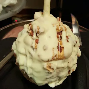 an apple covered in icing