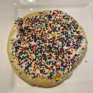 sprinkles on a sugar cookie