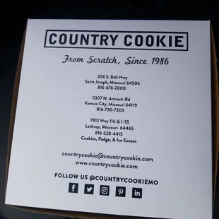 a box of cookies in the back of a car