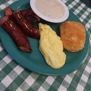 Smoked sausage, scrambled eggs, biscuit and gravy.