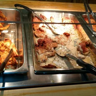 a variety of food items in a buffet