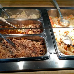 a variety of food items in a buffet