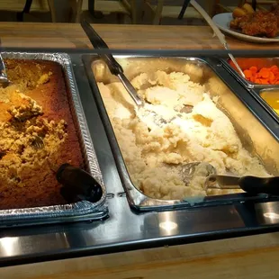 a variety of food in a buffet