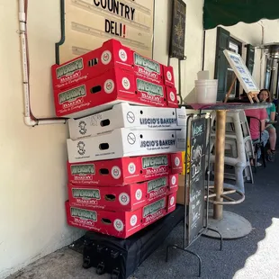 a stack of pizza boxes