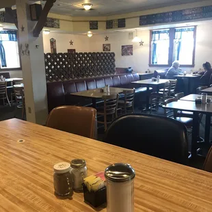 a table with two jars of condiments on it
