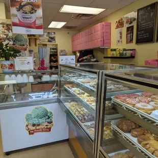 a bakery with a variety of doughnuts