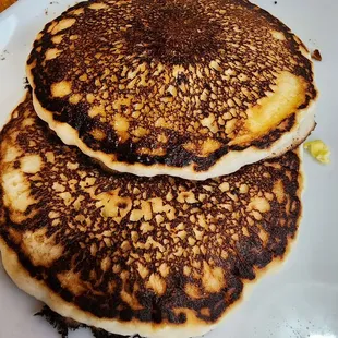 The little one was teary-eyed because she couldn&apos;t eat these burnt pancakes. Spent money on a second breakfast elsewhere