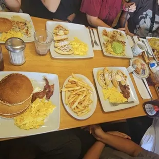Pancakes, omelette, stake sandwich, chilaquiles