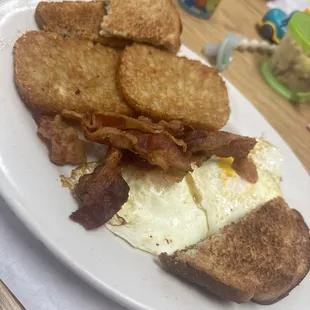 2 eggs, toast, bacon + hash browns