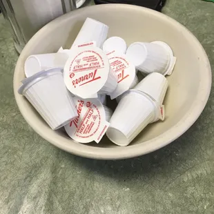 a bowl of coffee cups