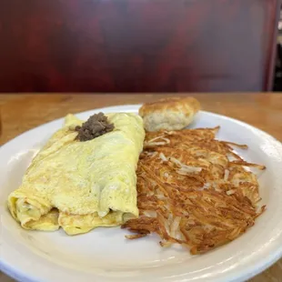 Beef bulgogi Korean omelette with hash browns and biscuit