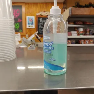 Hand sanitizer at the deli counter.