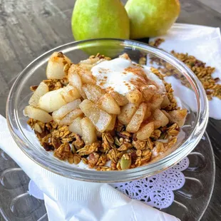 Autumn Yogurt Parfait Bowl with housemade pumpkin granola and cooked pears.