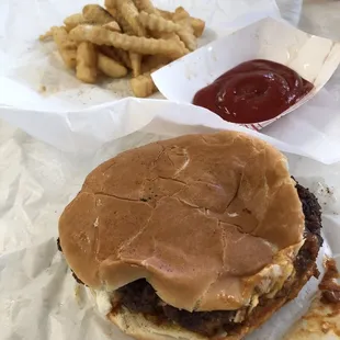 Cheeseburger mustard chili slaw and onions with fries.