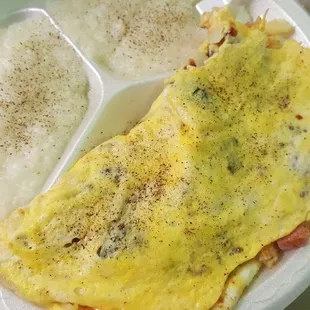 an omelet, rice, and a side of rice